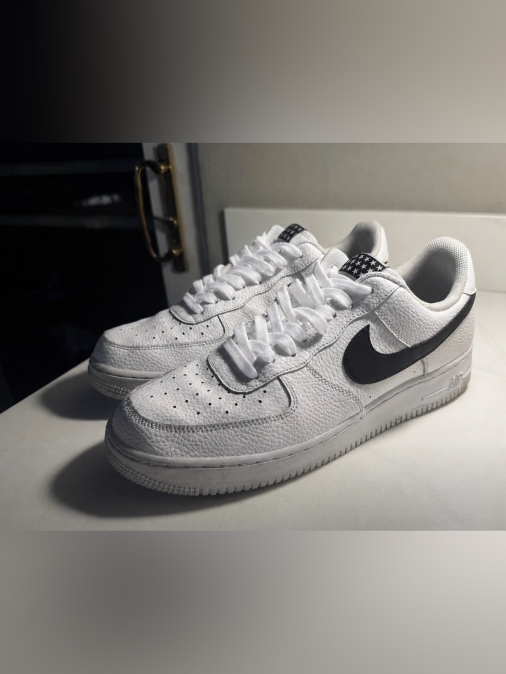 Men's White Leather Sneakers with Black Swoosh Accent